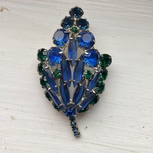 Rhinestone pin. Blue and green stones.